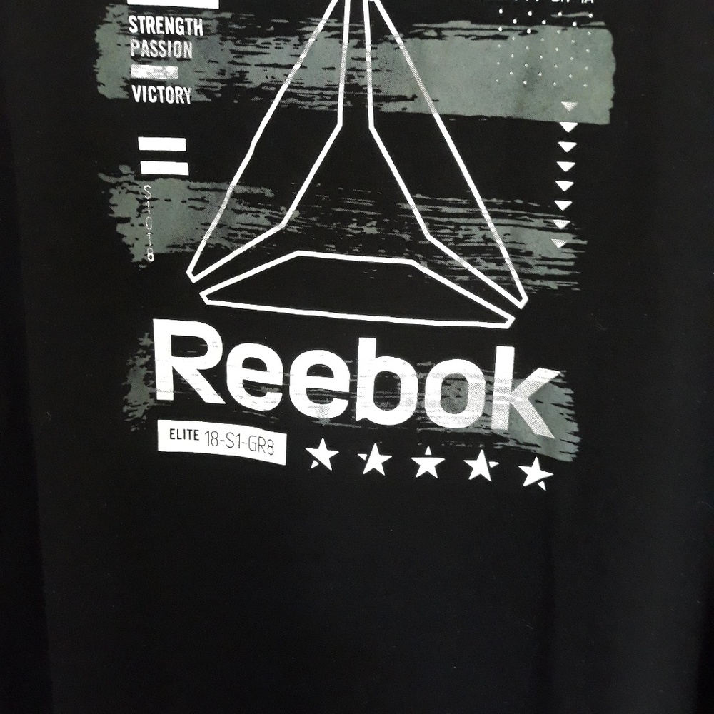 A mock sleeve black, white and gray Reebok tee